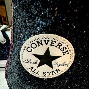 Chuck Taylor Converse High Tops.